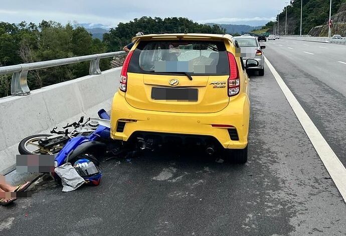 Motorcyclist rams into car